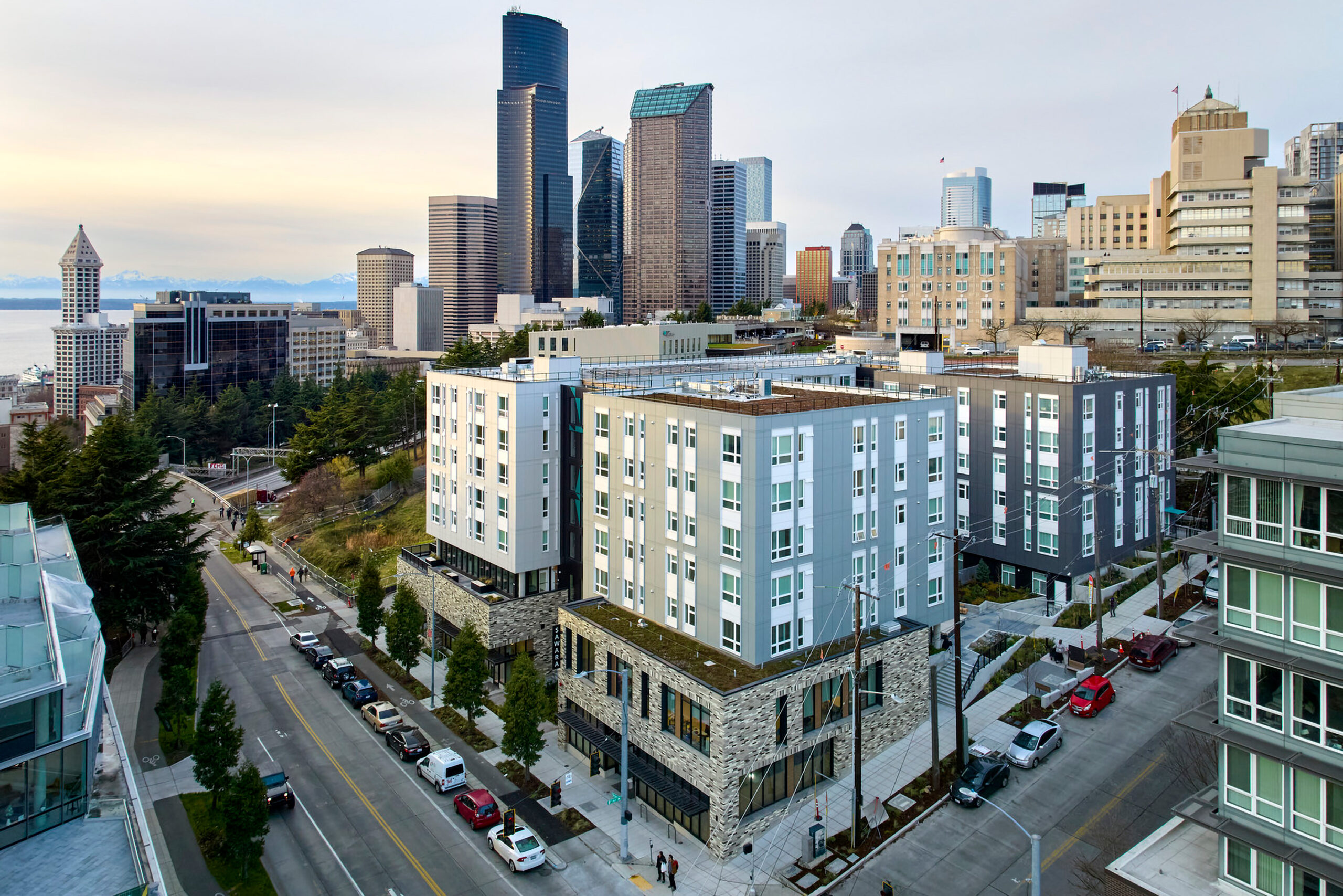 Exterior of Sawara Apartments, a modern affordable housing development in Seattle’s Yesler neighborhood